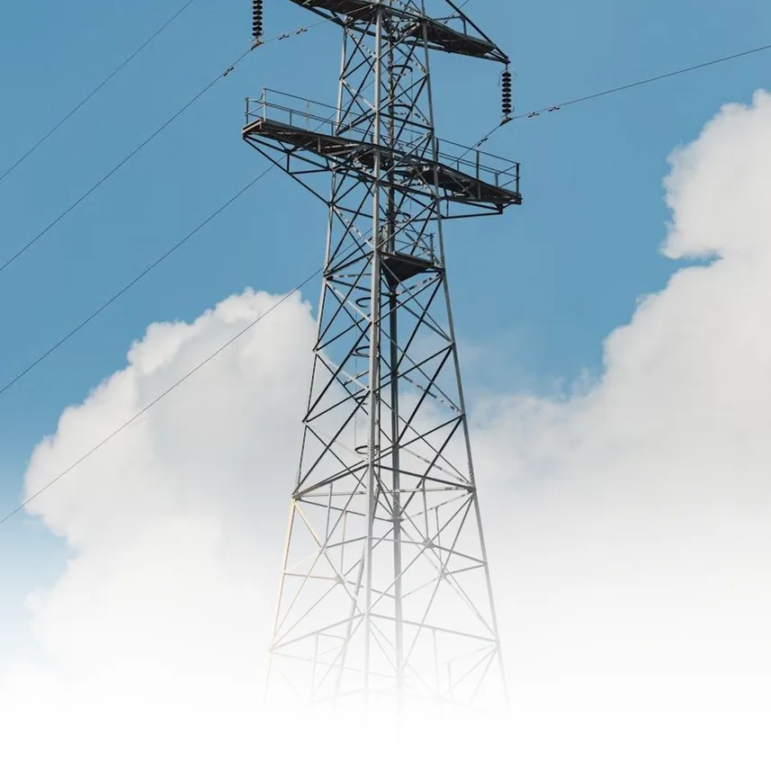 Transmission tower against a cloudy sky