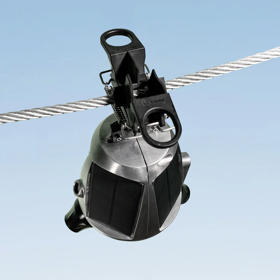 SENTRI sensor hanging from a conductor